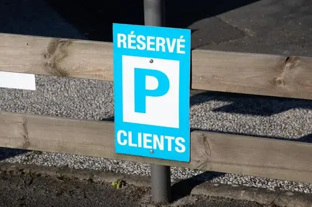 Parking sign indicating reserved client parking at the Bryan Fagan Law Office in Houston.